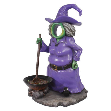 witch picture op 6 Foot tall with purple dress, green skin and witches hat side view