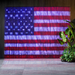 LED curtain display with American Flag pattern in red, white, and blue.