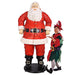 Life Size Santa - 6 Feet - front view - standing beside a small person dressed as Santa's assistant on a white background