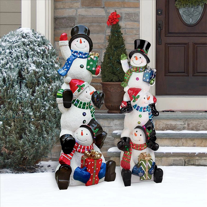 Outdoor Snowman Decoration along with other size front view outside a house with other Christmas ornaments in the background