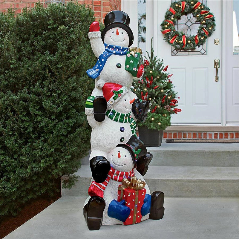 Outdoor Snowman Decoration front view outside a house with other Christmas ornaments in the background