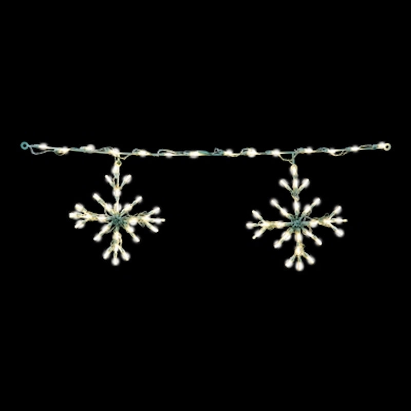 Close up of snowflake outdoor lights in color warm white