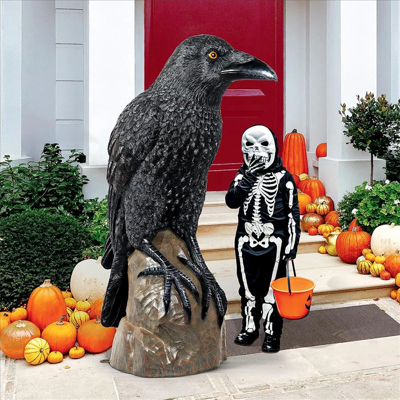 Gothic Raven Statue - Large 5 Feet Tall with child wearing skeleton suit in a Halloween setting