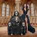 Grim Reaper Skeleton Throne Chair Decoration with person posing in a Gothic setting