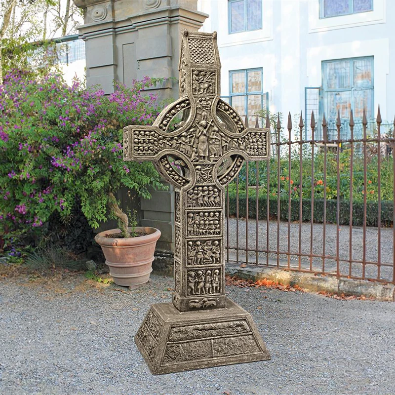 Large Muiredach Celtic Cross Statue front view in a garden